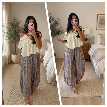 Woman wearing the Boho plaid balloon pants in Lavender, mirror selfie with a cropped top