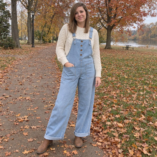 Woman wearing Easyalls in Light Blue with a cream sweater in an autumn park