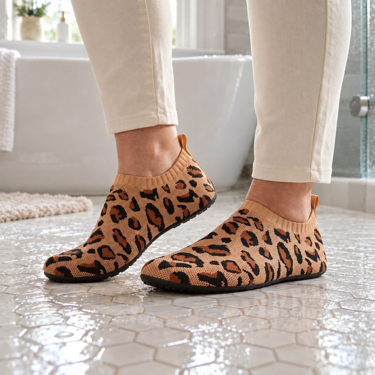 Feather Sock leopard brown on a wet bathroom floor