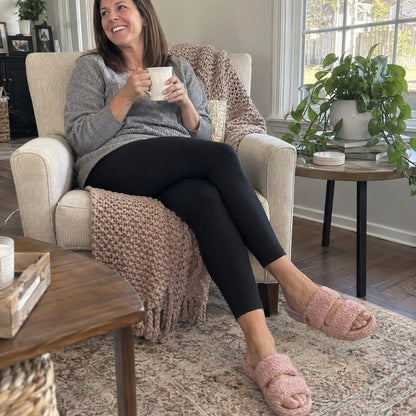 Woman wearing Fuzzy slides in Dusty Rose at home