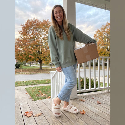 Woman wearing Fuzzy slides in Vanilla Ice at home