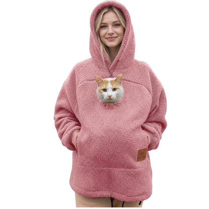 Meowdie cat pocket hoodie in Pink, cat peeking out of the zip pouch