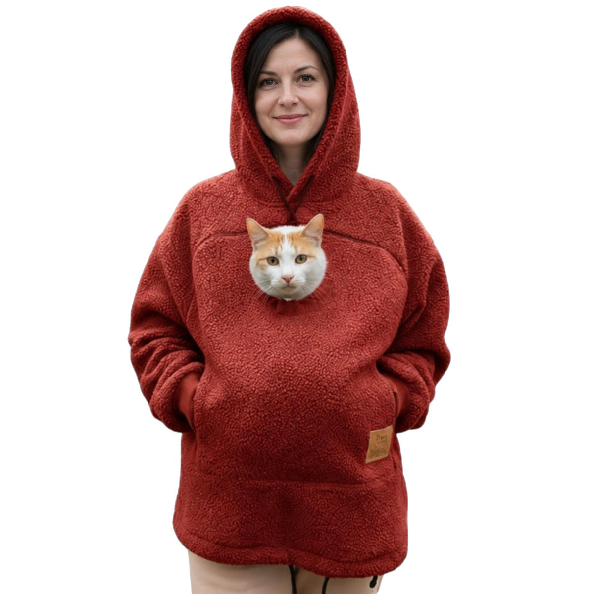 Meowdie cat pocket hoodie in Red, cat peeking out of the zip pouch