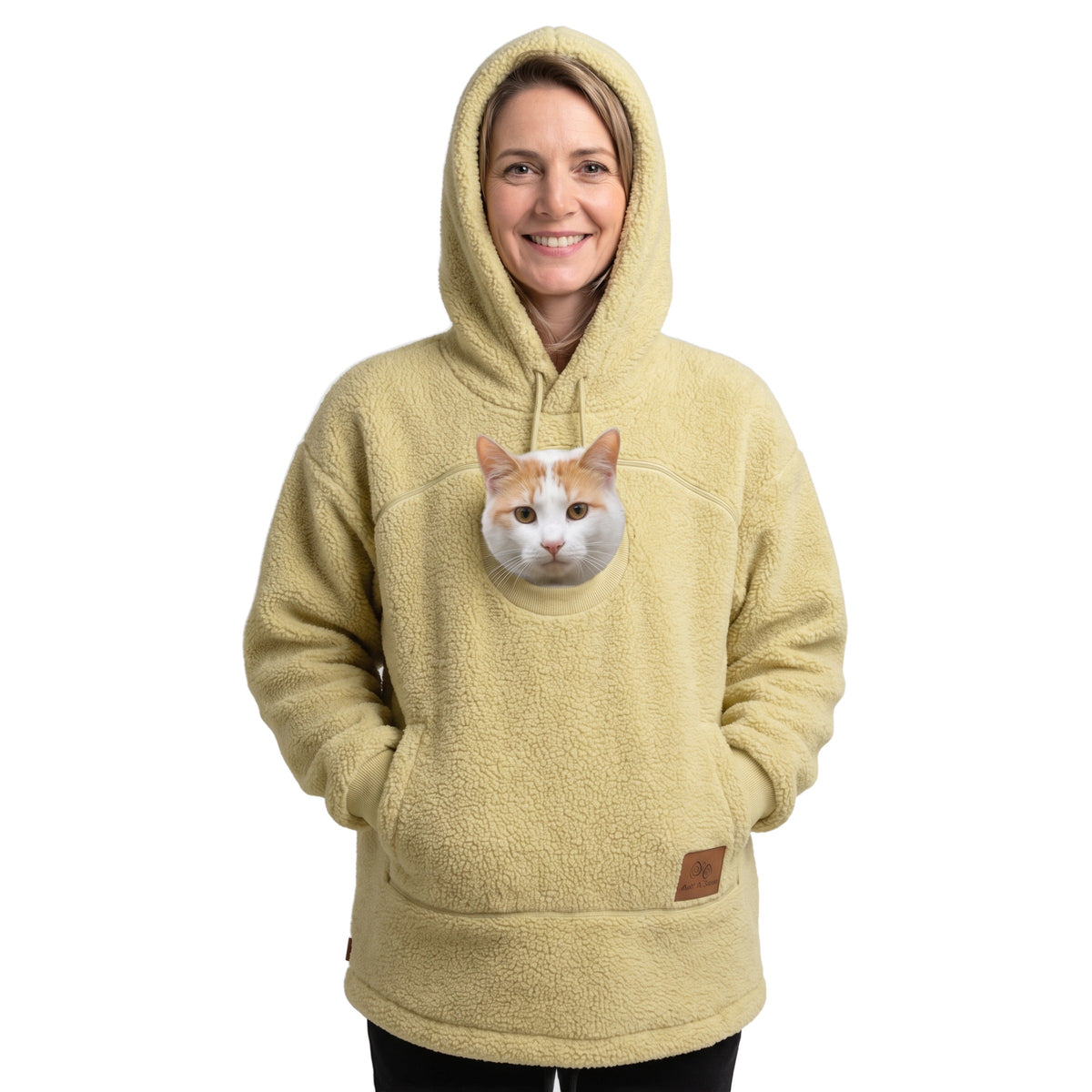 Meowdie cat pocket hoodie in Yellow, cat peeking out of the zip pouch