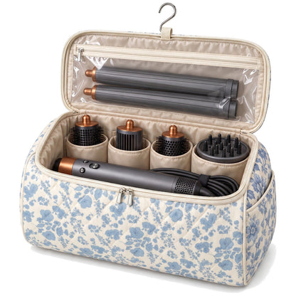 Wrappy bag open with an Airwrap styler, cord and six attachments packed inside