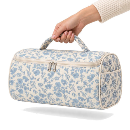 Wrappy hair tool bag carried by its padded handle