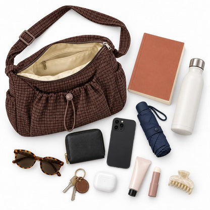 What fits in Zippy: wallet, phone, keys, a book and a water bottle